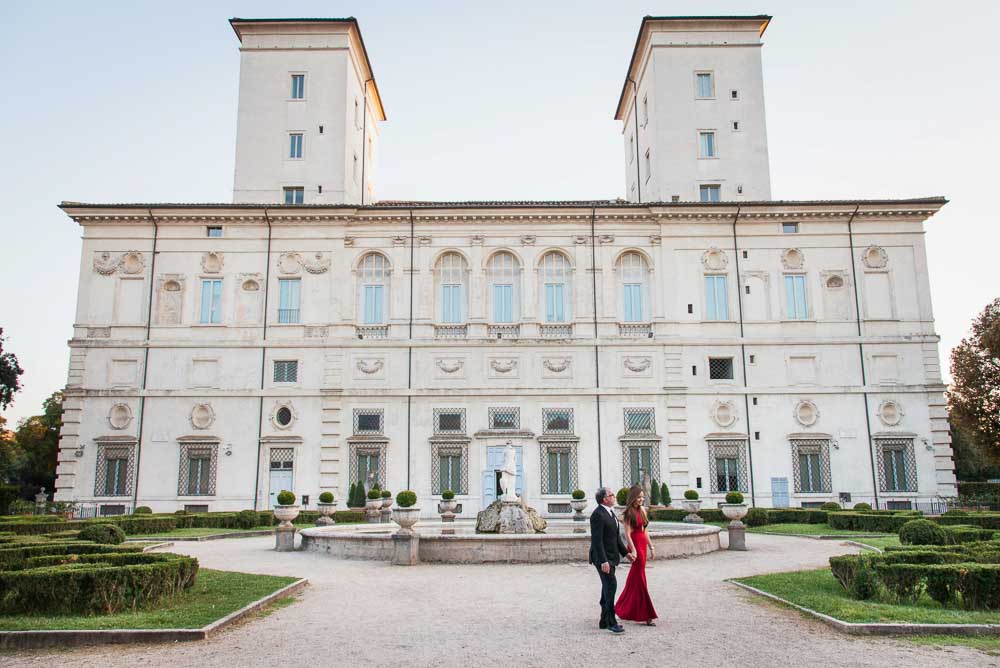 Couple in the Villa Borghese gardens walking