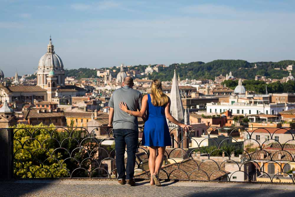 Just engaged couple looking out of the view from Parco del Pincio