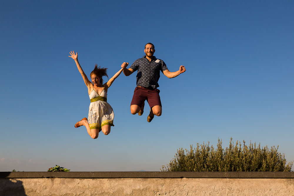 Fun engagement pictures taken while jumping in the air