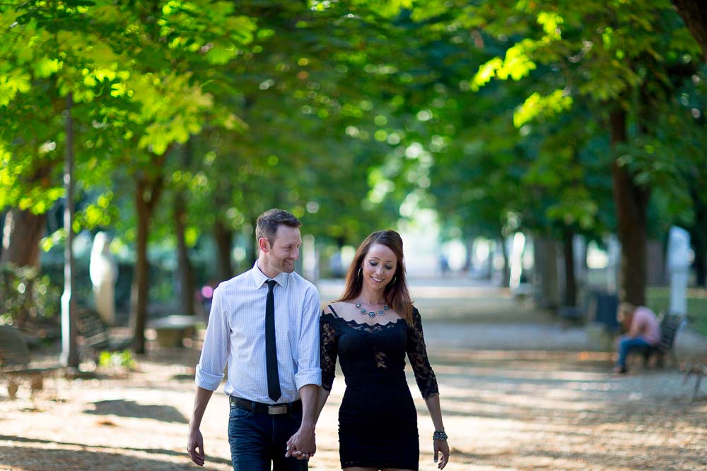 Walking under trees with bright green leaves