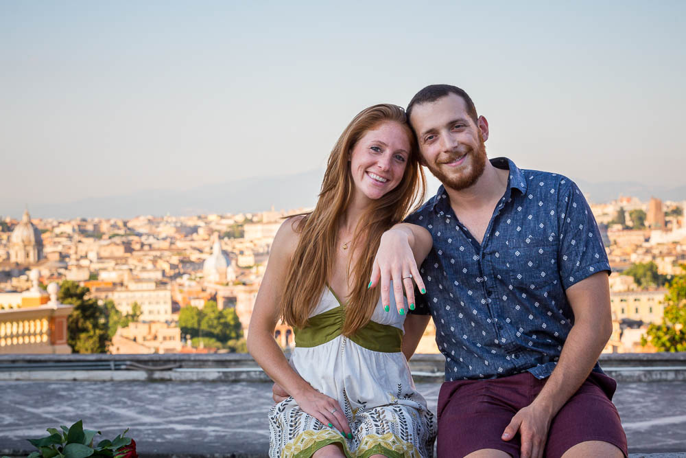 Showing the engagement ring to the viewer