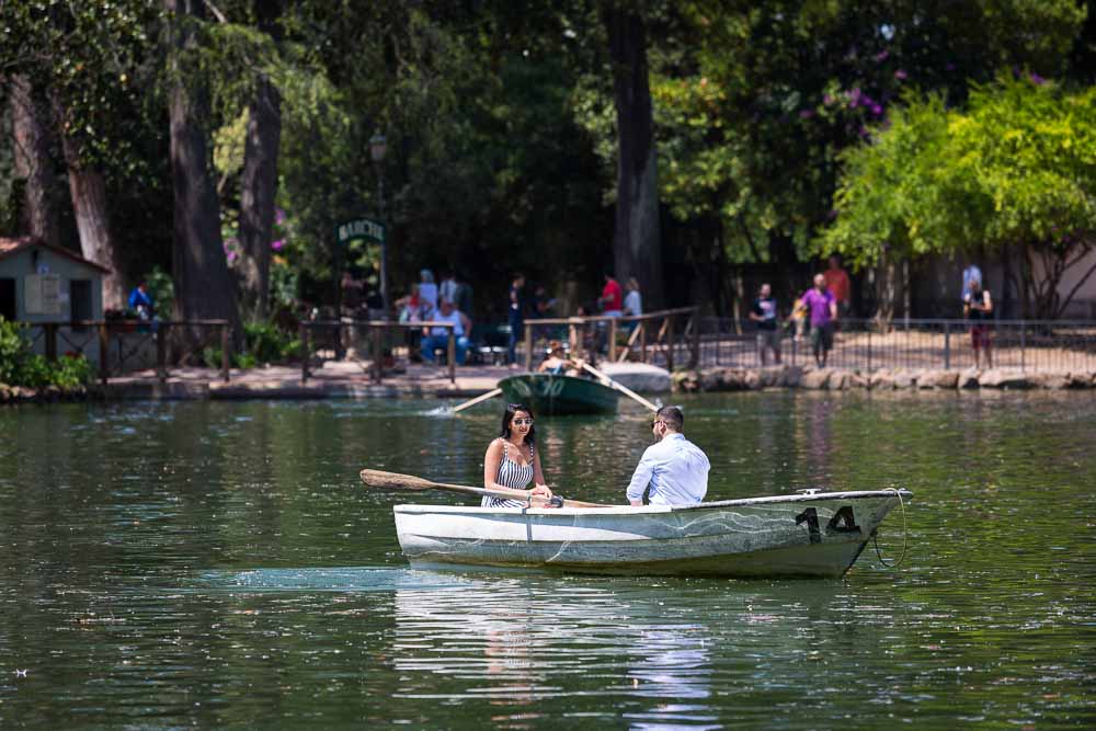 Taking a row boat for a ride in the Villa Borghese small lake