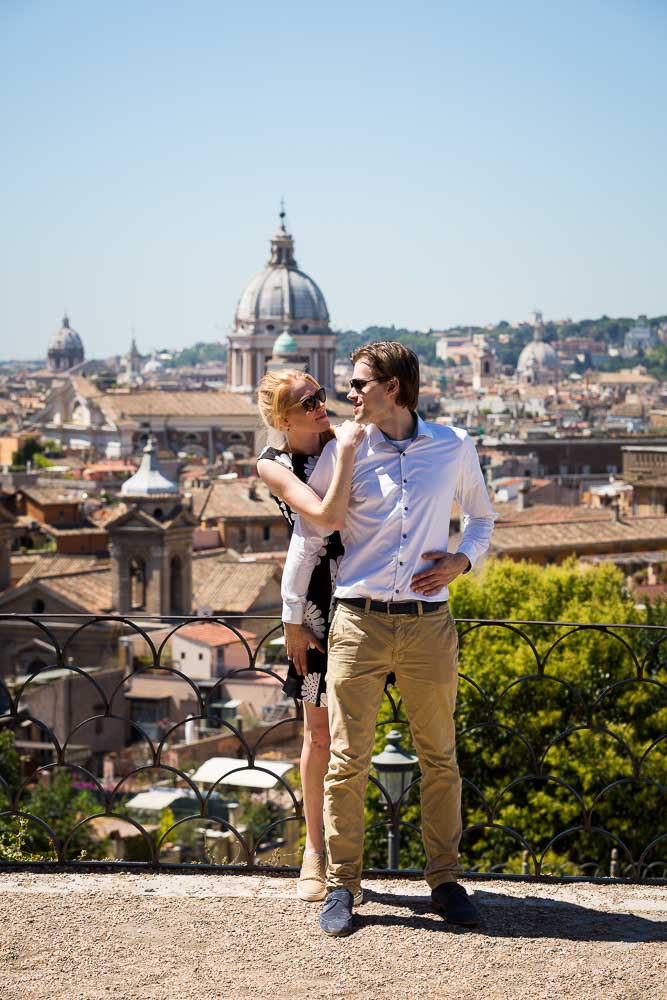 Taking pictures at the Pincio terrace overlooking the roman skyline