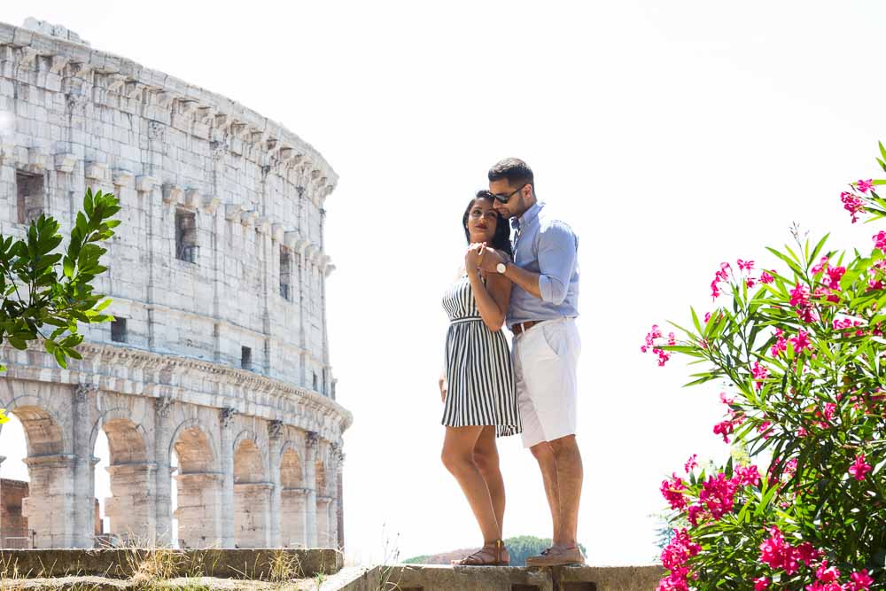Romance by the Colosseum portrait posing during an engagement photo shoot