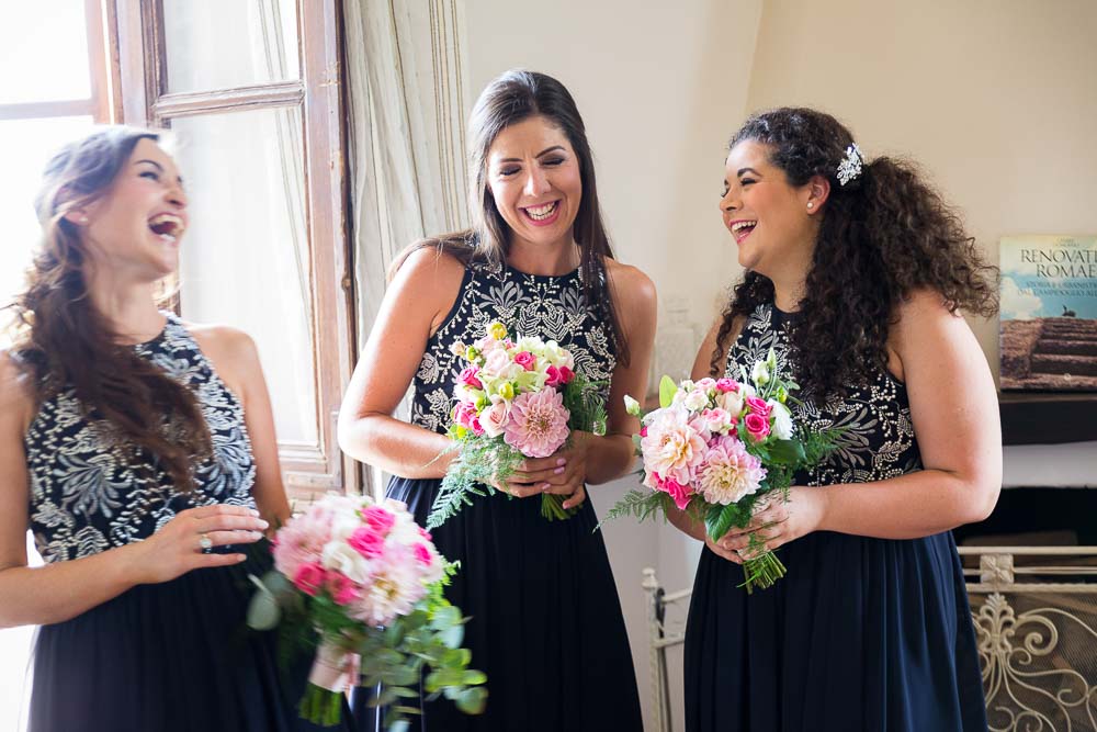 Bridesmaids laughing on the wedding day