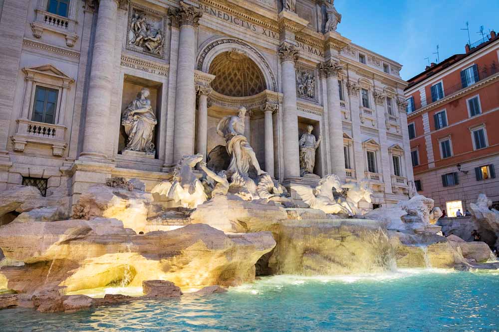 The Trevi fountain lit up at night