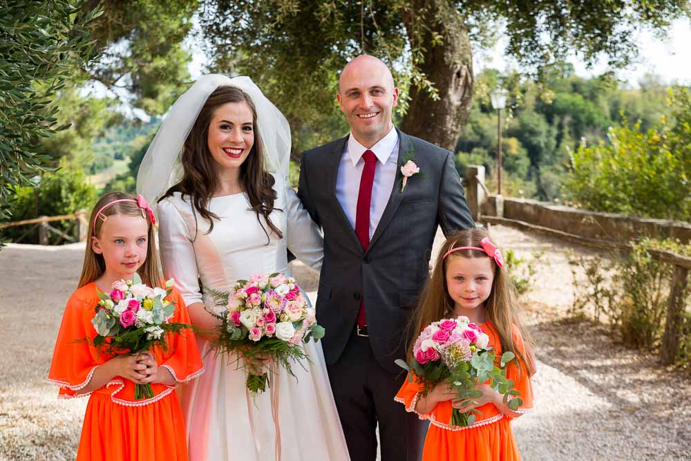 Wedding party portrait with the flower girls