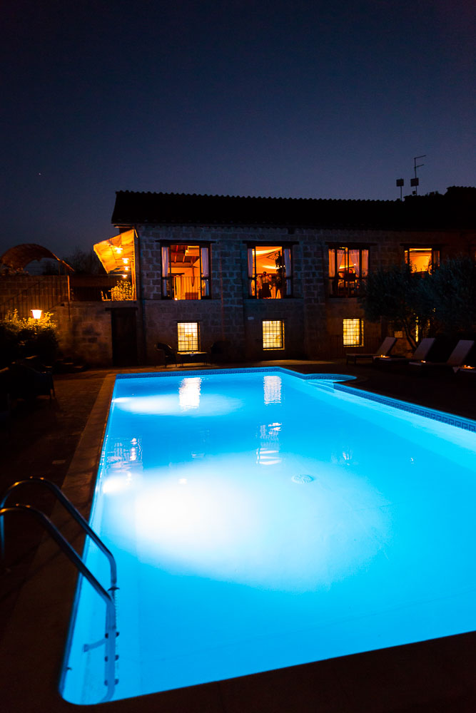Night time image of the swimming pool