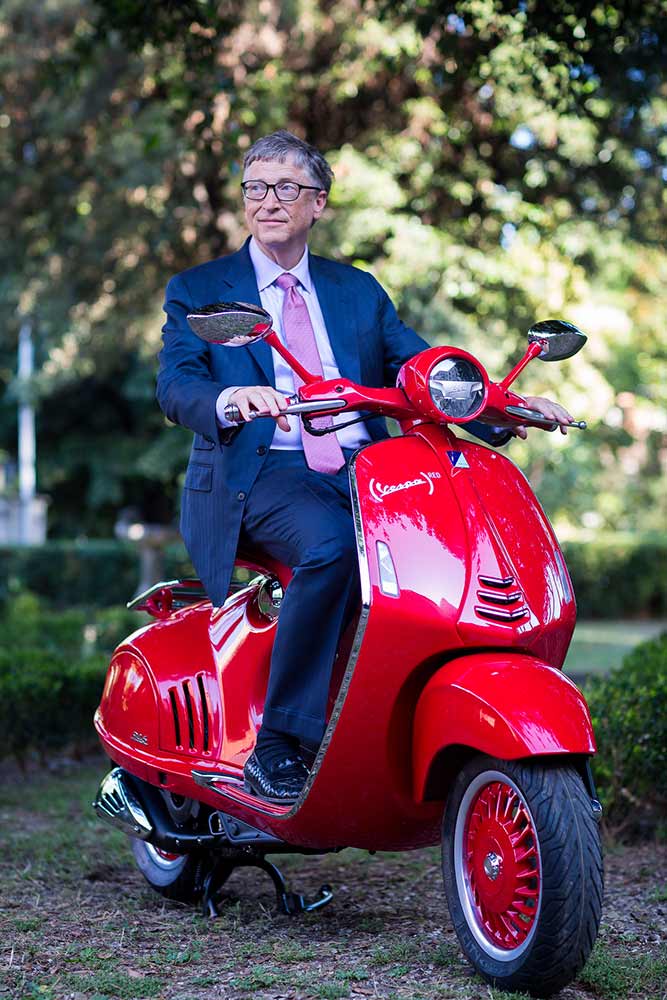 Bill Gates on Red Vespa