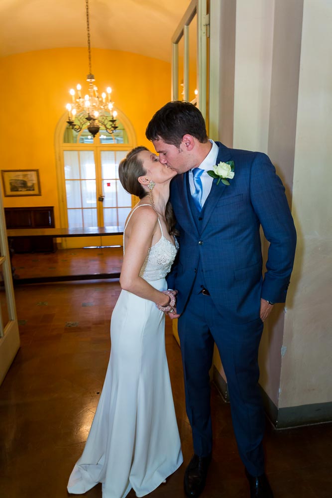 Bride and groom first look kiss