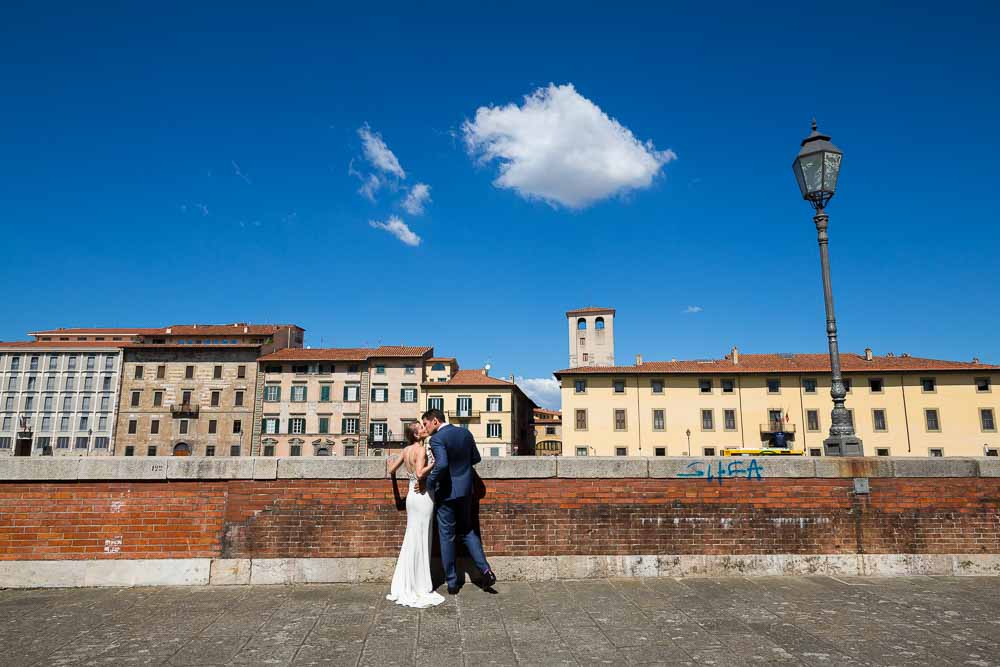 Just married couple during their photography session in Pisa. Pisa Destination Wedding Photography service 