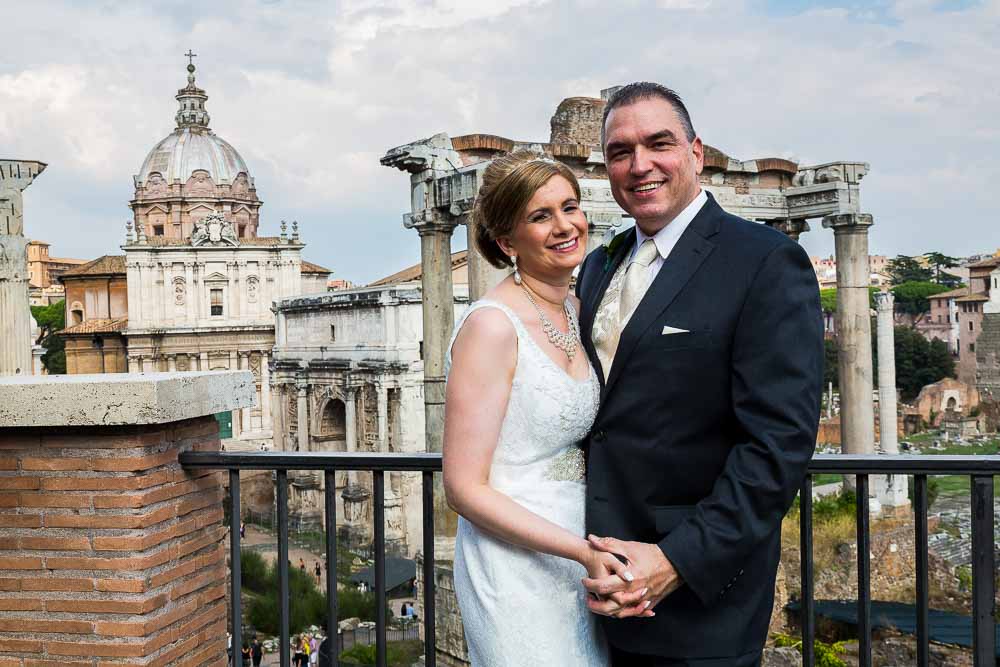 Wedding couple posing in front of the Roman Forum