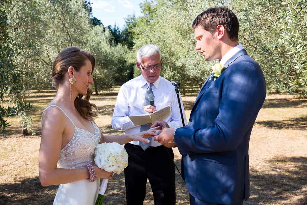 The exchange of the wedding rings. Pisa Destination Wedding Photography