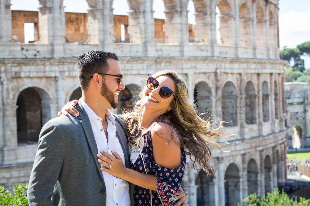 Fun at the Colosseum during an engagement photography session in Rome