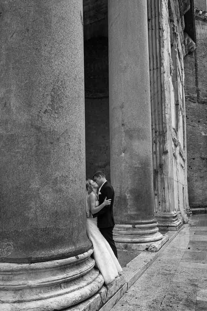 Standing together under large columns at the Pantheon