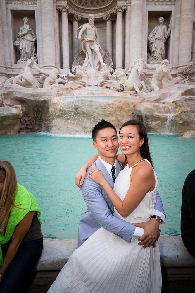 Sitting together by the Trevi fountain