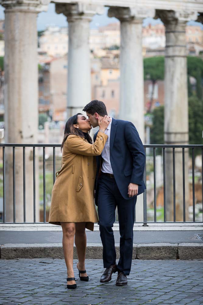 Romantic walking couple photography kissing in Rome Italy
