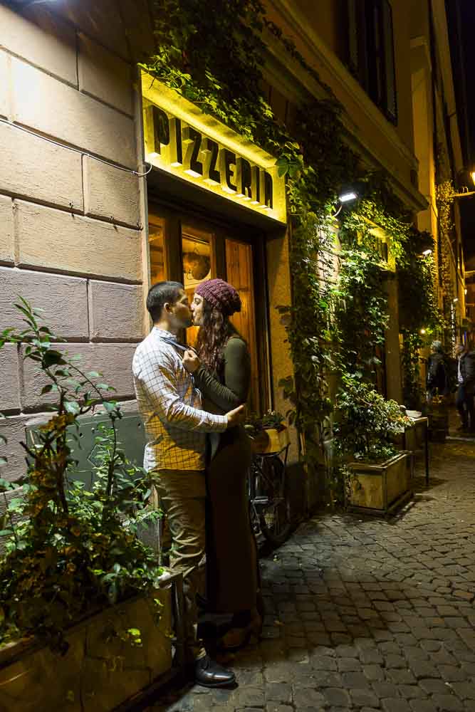 Romantic imagery of a man and woman together in the streets of Rome