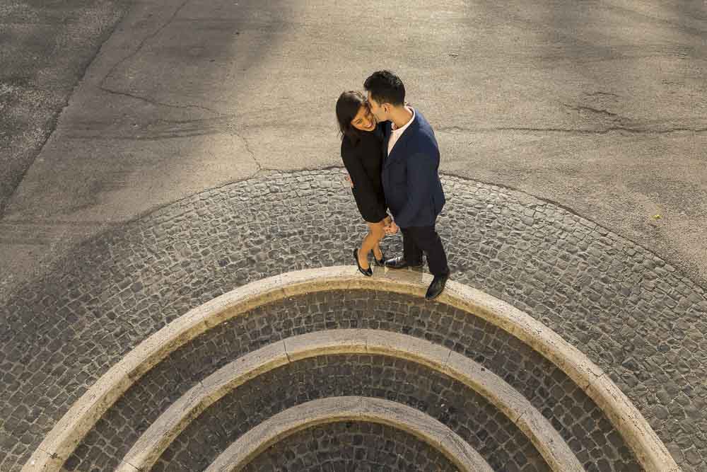 Engagement photography by circular staircases