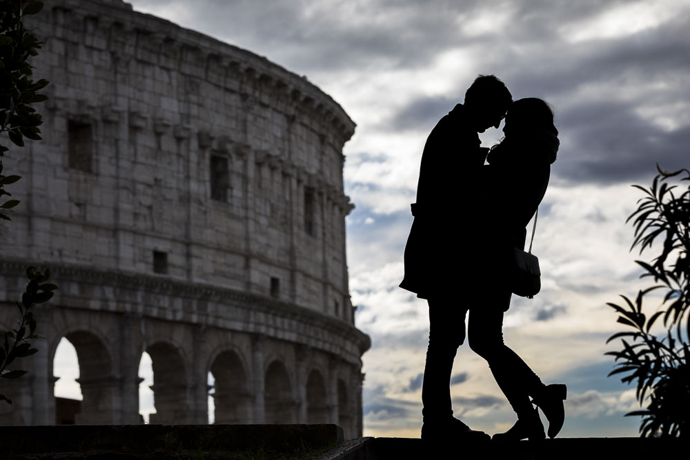 Silhouette creative engagement imagery. Picture taken at the Coliseum in Roma at sunset