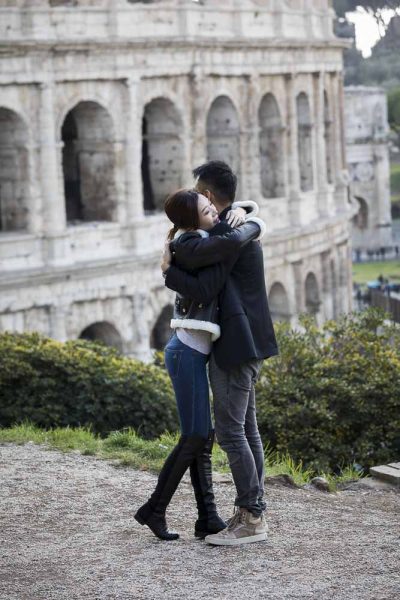 In love in Italy by the Coliseum