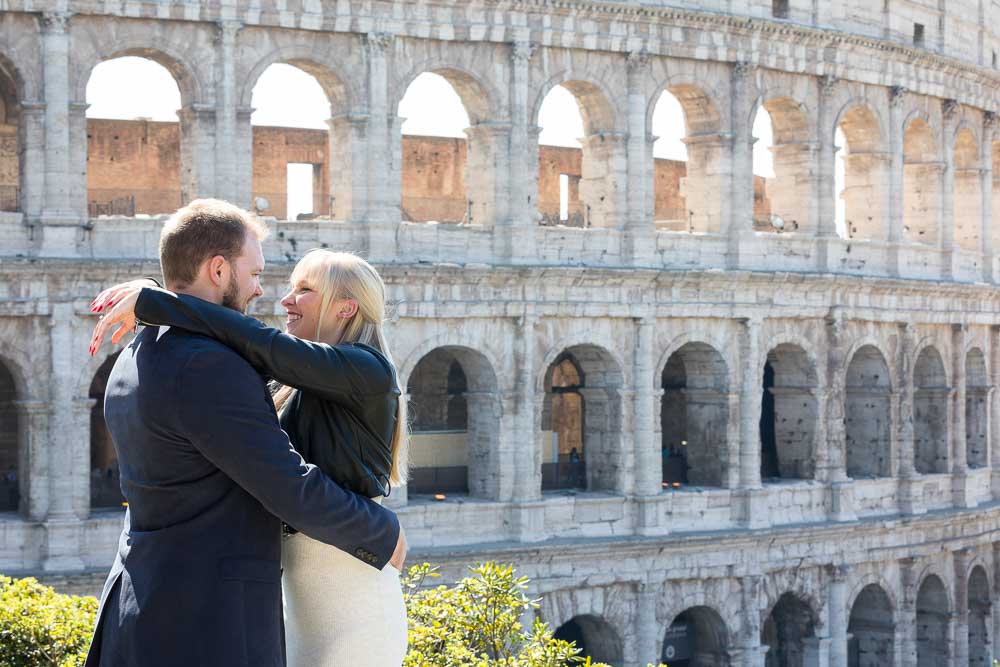 Engaged couple portrait at the Coliseum