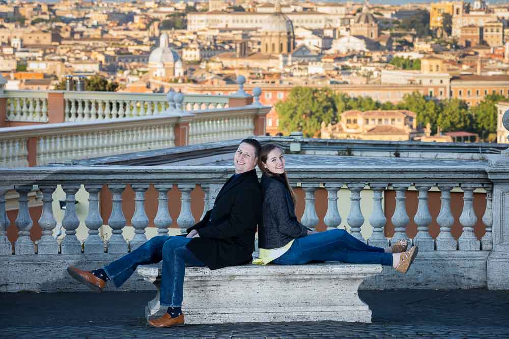Sitting down on a marble bench over the roman skyline
