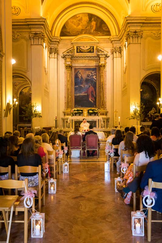 Church decorated interior during ceremony