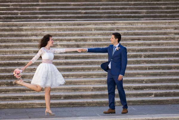 Stretched out pose couple photo session taking pictures on the Capitoline steps