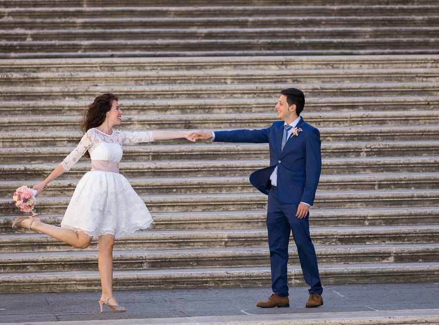 Stretched out pose couple photo session taking pictures on the Capitoline steps