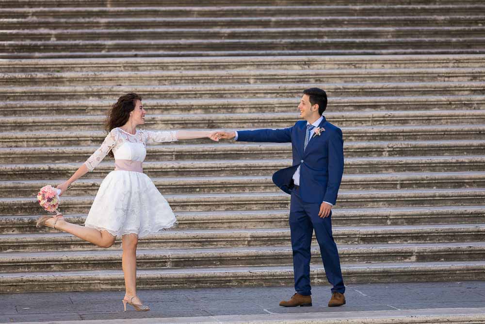 Stretched out pose couple photo session taking pictures on the Capitoline steps