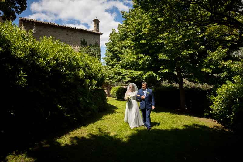 Bride walking in the ceremony together with her father