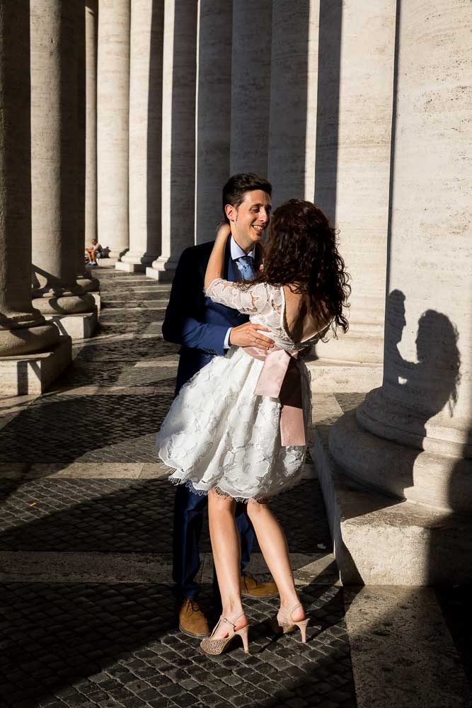 Dancing light underneath the columns of Saint Peter's square