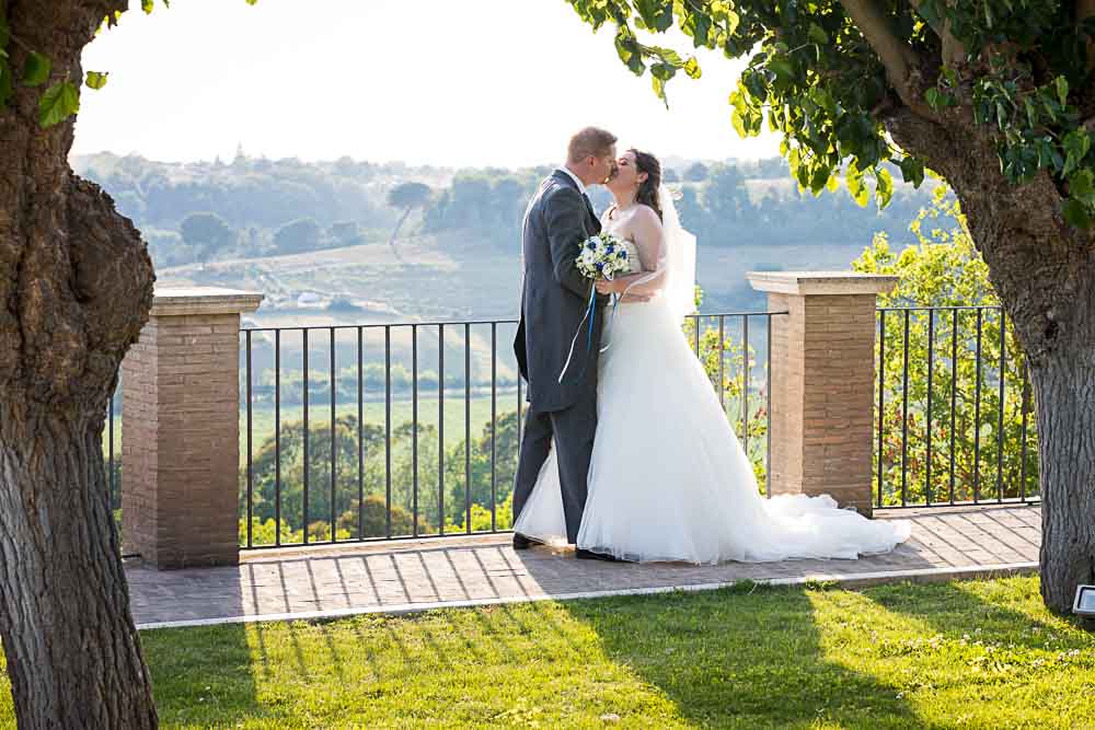 Newlyweds photo session with panoramic view over the Italian countryside