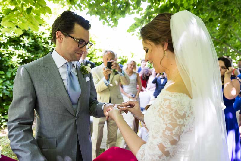 Wedding ring exchange during the symbolic ceremony