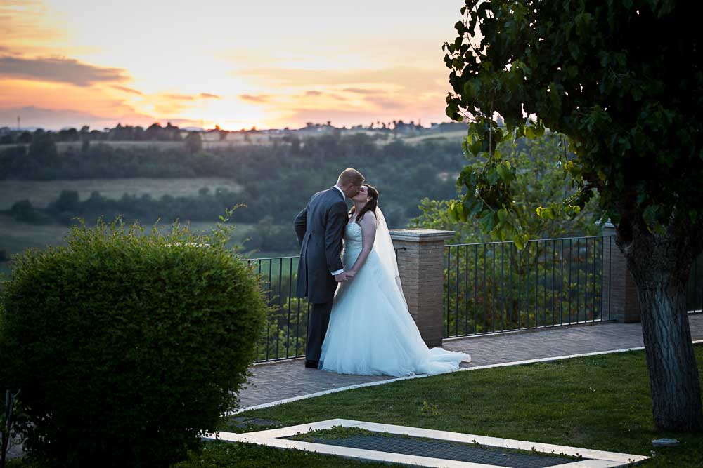 Sunset wedding couple pictures over the roman horizon