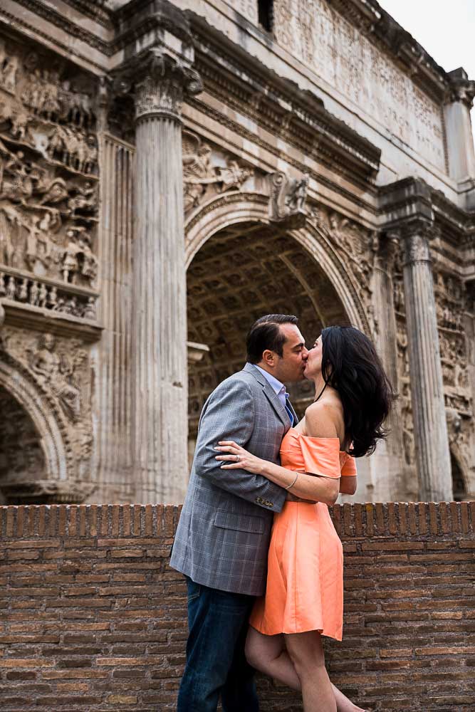 Kiss under arch