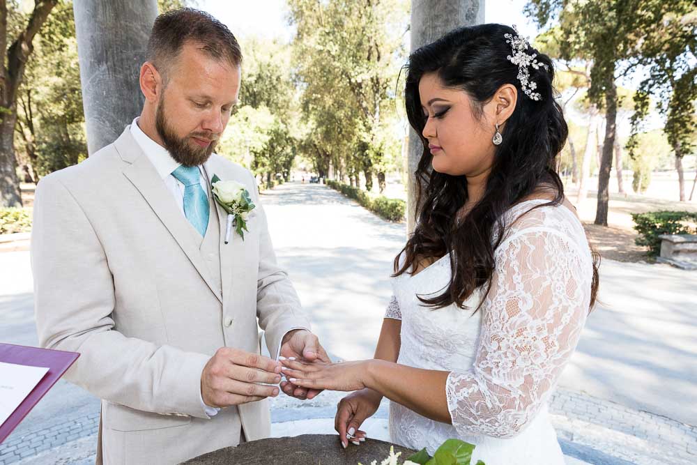 Bride and Groom exchanging nuptial rings