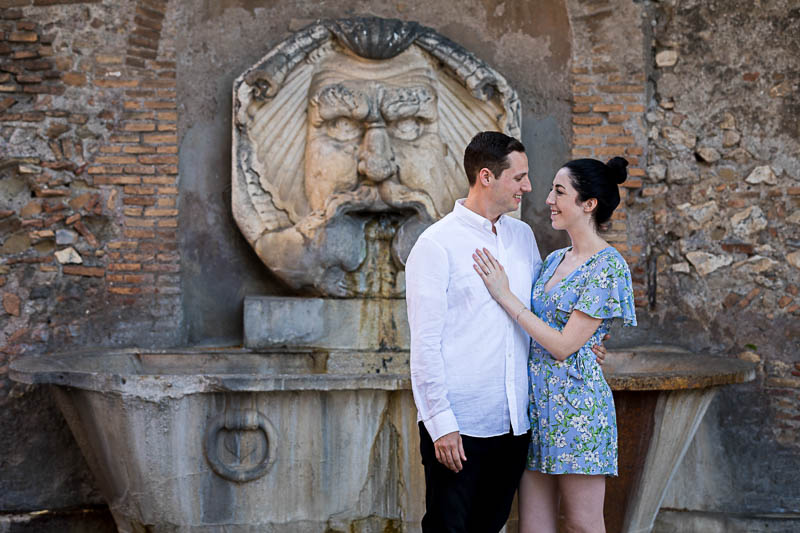 Just engaged portrait couple picture taken by a water fountain