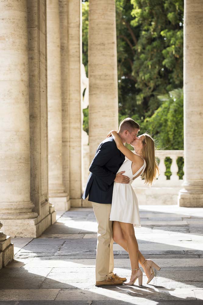 Kissing under colonnade in Campidoglio