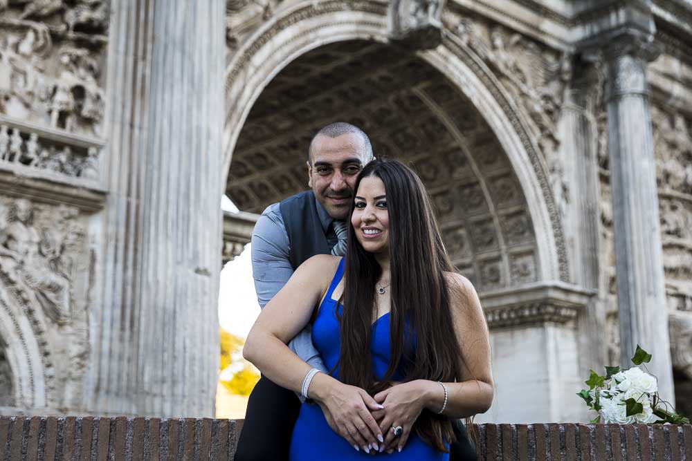 Portrait image of a couple under an arch