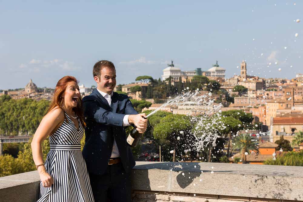 Engagement celebration splashing around prosecco wine