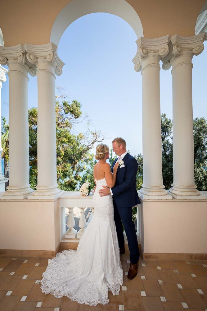 Inside balcony photography of newlywed couple