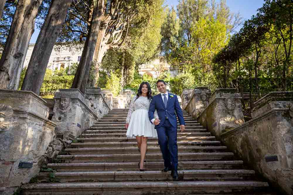 Couple descending stairs