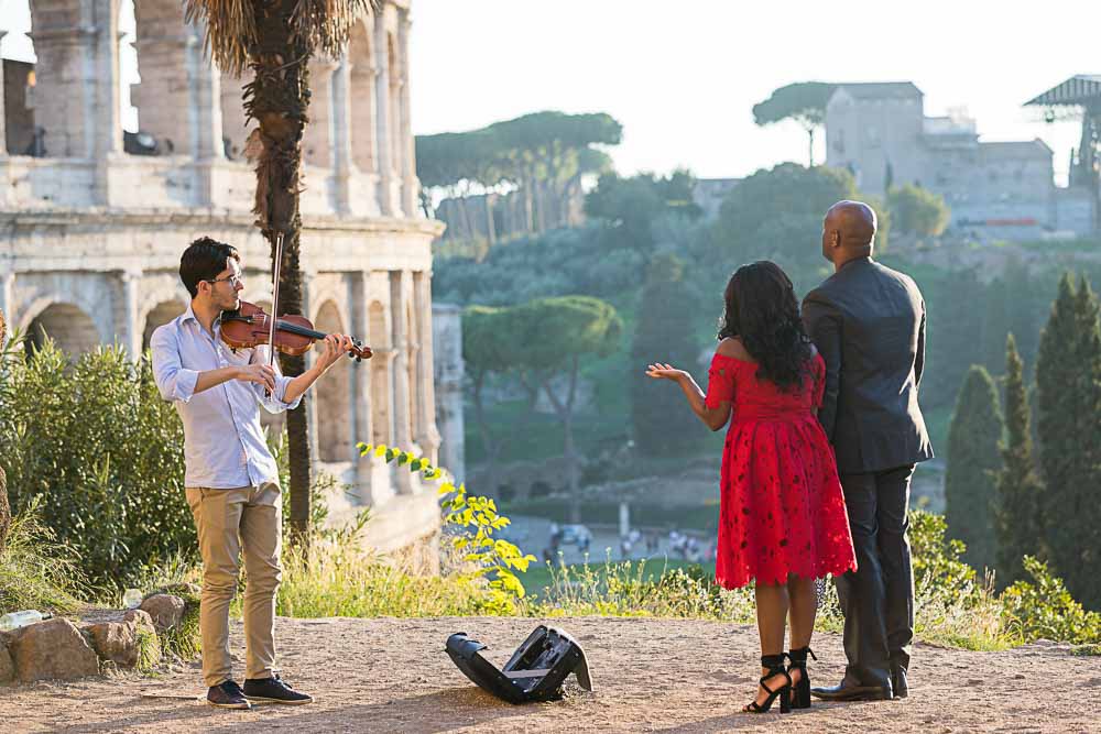 Proposing marriage with the music of a violin player. Rome Wedding Proposal