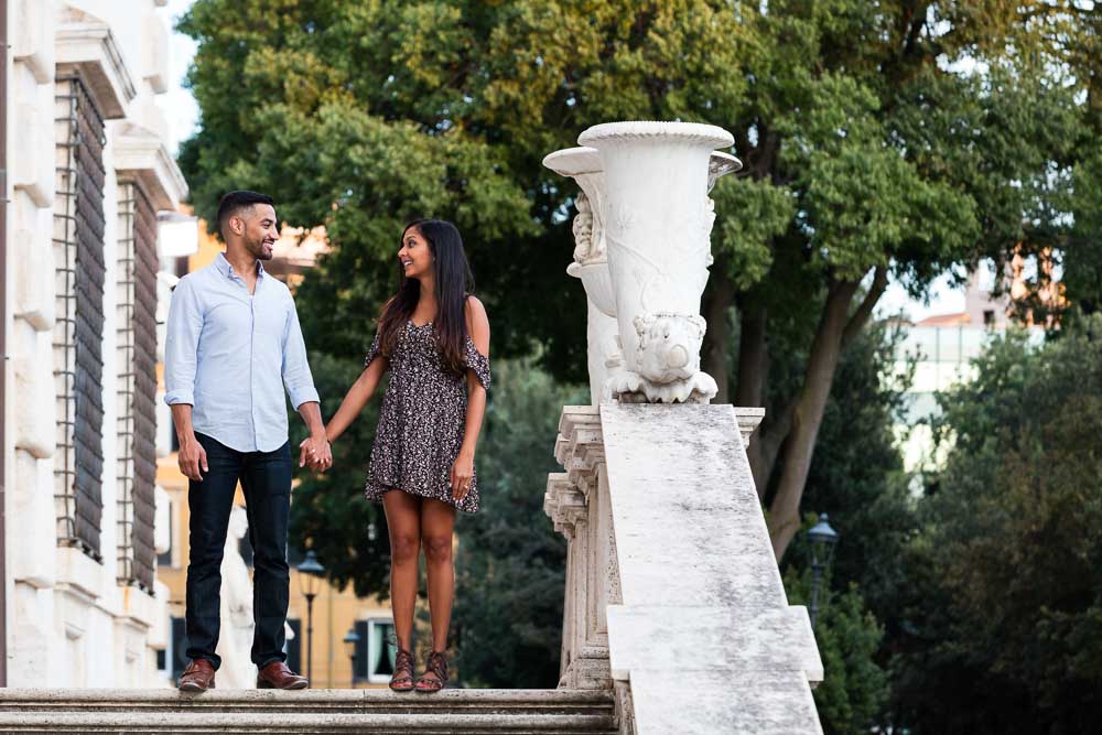 Couple photo session standing on marble staircases