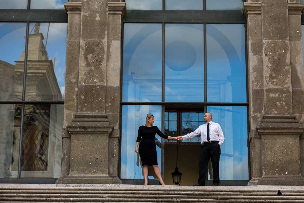 Snapshot on top of the stairs in front of a building