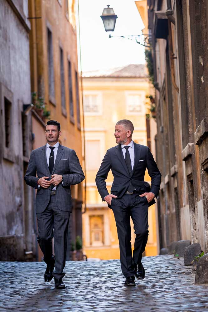 Walking in the streets of Rome Italy during a couple photo shoot