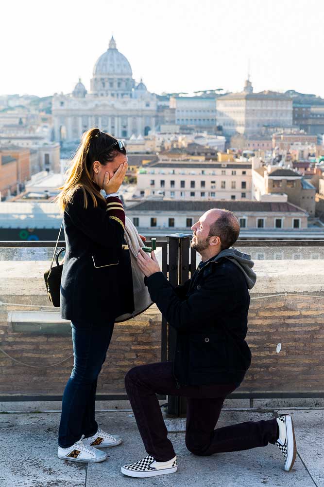 Man proposing marriage overlooking the roman skyline from above