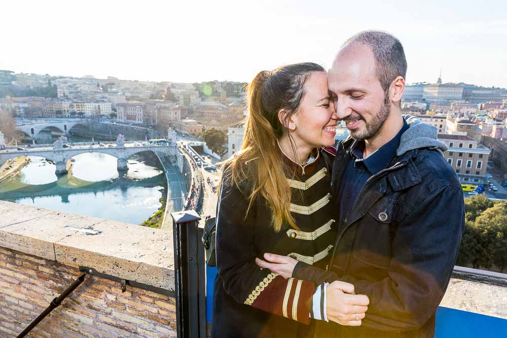 Couple portrait happily together overlooking the roman rooftops